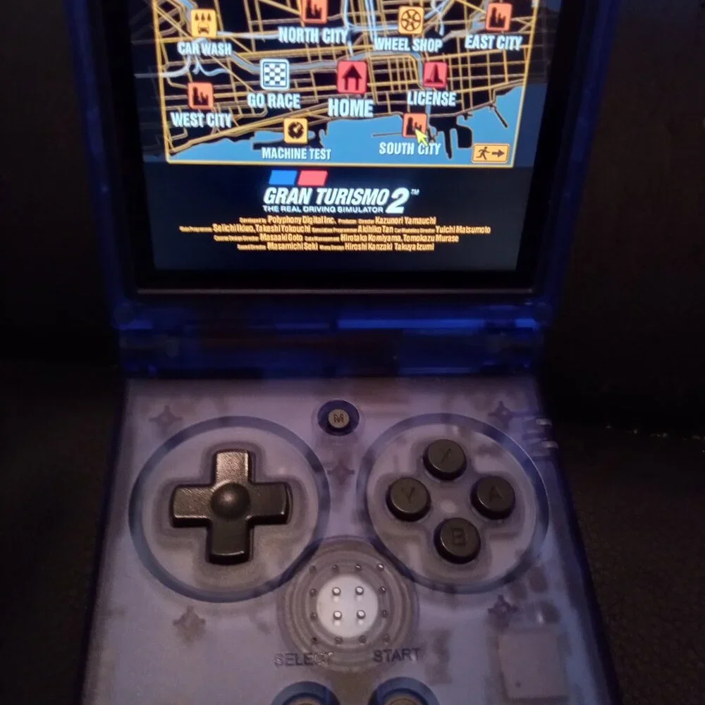 Pre-Loaded Anbernic RG35XXSP blue transparent with most retro platforms 64gb